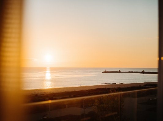 Sunset View Over the Sea from the Hotel Balcony